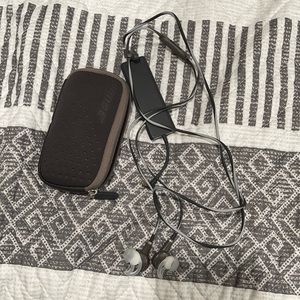 Bose headphones with noise cancellation.